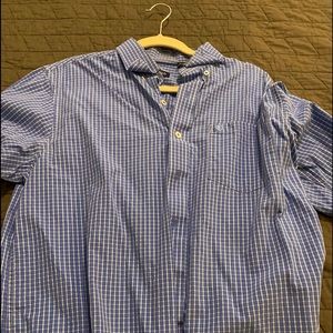 Casual blue/white shirt.